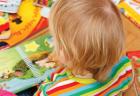 Toddler with books