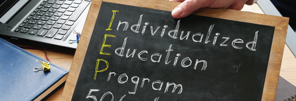 A handheld chalkboard with the words