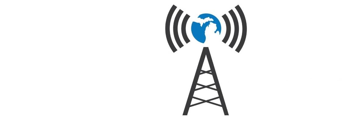 An illustration of a radio tower. On top of the tower is a circular blue and white outline of Michigan surrounded by radio waves.