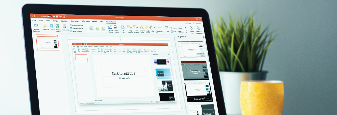 A laptop computer running the Microsoft PowerPoint program.