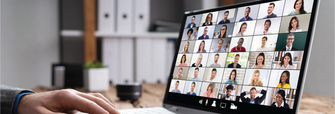 Closeup of someone in a video call with several other people.