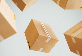 Beige shipping boxes are suspended in midair against a gray background.